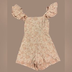 Ruffle trim tie backless Romper. Size extra small